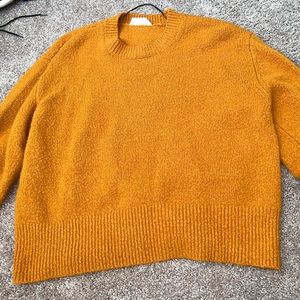 Orange knitted sweater